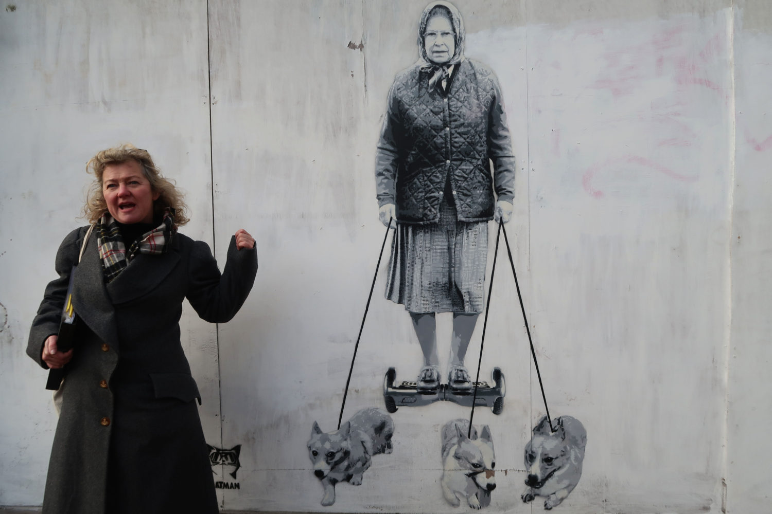 Amanda Greatorex standing in front of East Dulwich street art