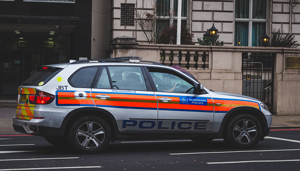 Police Car Patrolling London Streets